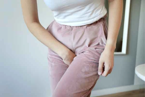 woman running for the toilet because of urinary incontinence Basingstoke